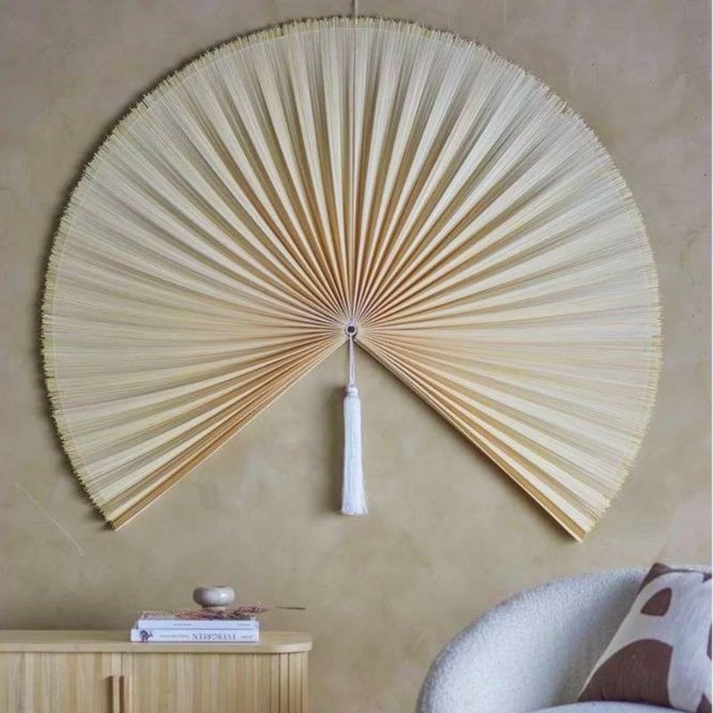 Large decorative fan for wall in minimalist entryway Large decorative fan for wall in minimalist entryway