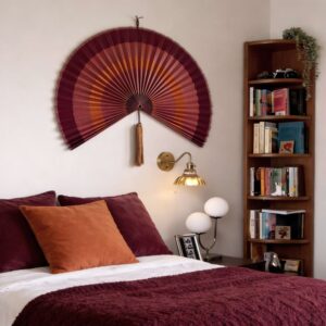 terracotta bamboo wall fan above bed.jpg